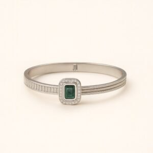 Women's Silver Plated Bangle with a central emerald-cut green CZ stone and side baguette CZ accents.