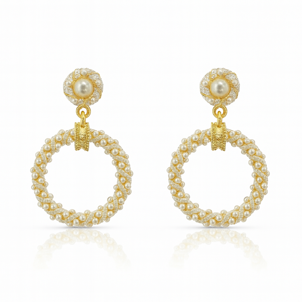 Gold Toned Drop Earrings featuring a pearl and pave CZ twisted round hoop dangling from a pearl and CZ stud.