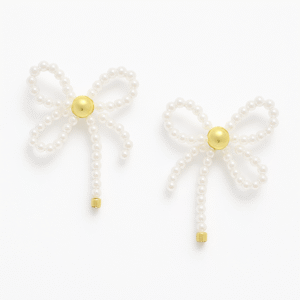 Gold and Pearl Beaded Bow Stud Earrings with tails, made from small imitation pearls and centered with a polished gold-toned bead.
