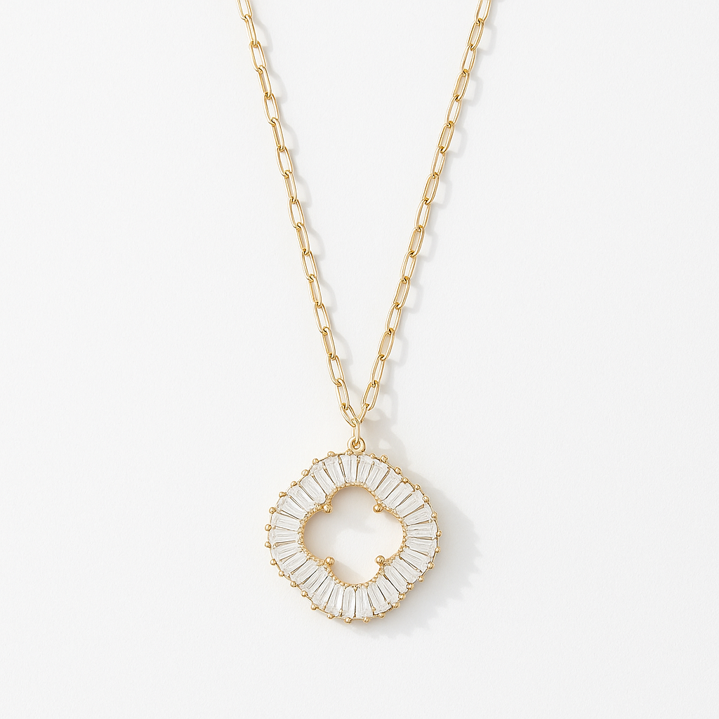 Gold Plated Paperclip Chain Necklace with a large round pendant featuring a four-leaf clover outline set with baguette cubic zirconia stones.