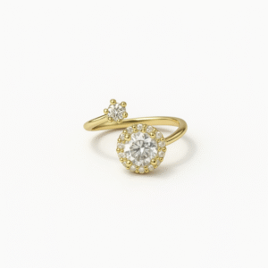 Women's Gold Plated Ring with a halo-set round CZ solitaire and a single accent stone in an open style.