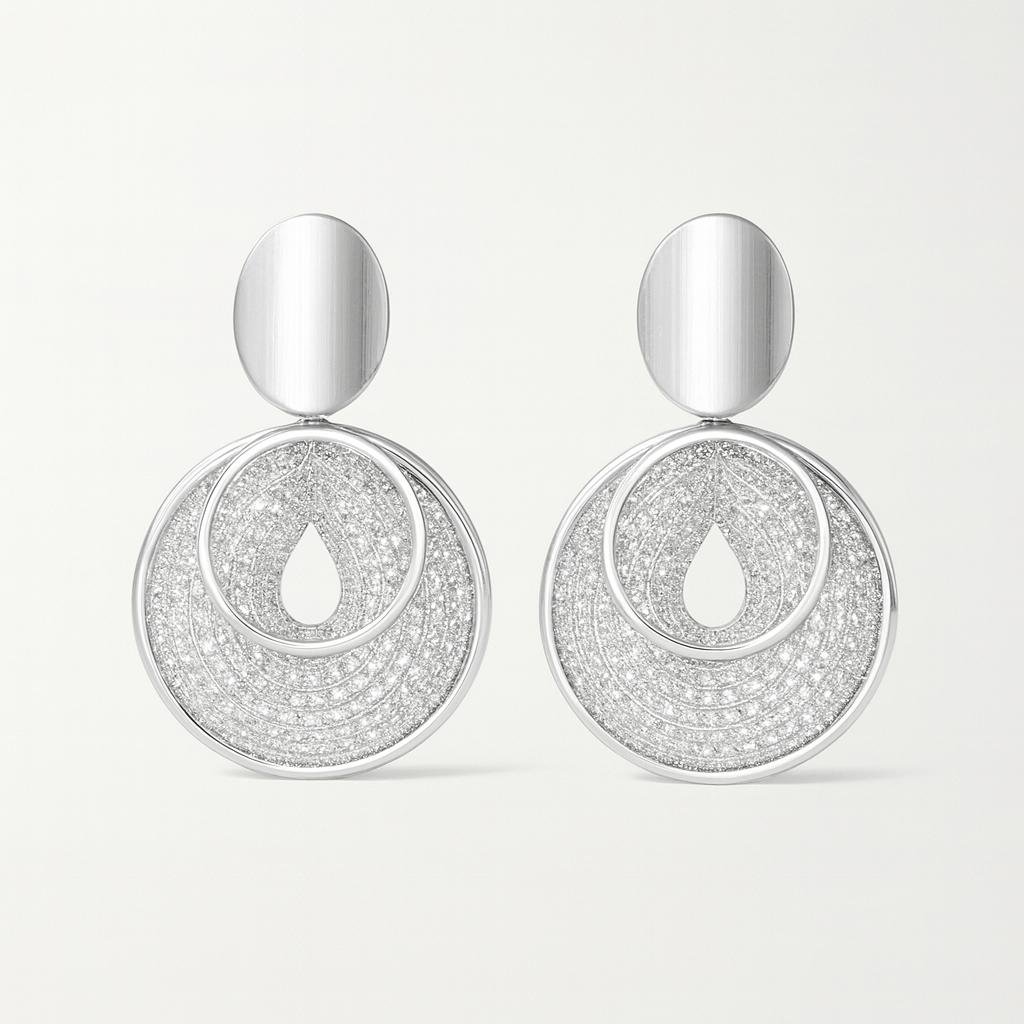 Silver Toned Statement Drop Earrings with a brushed oval stud and large concentric circular drops fully paved with sparkling CZ stones.