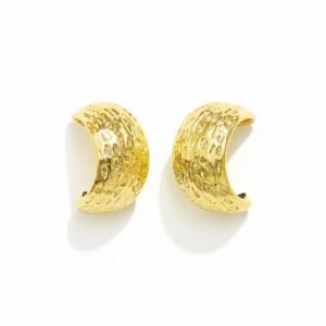 Gold Toned Wide Huggie Hoop Earrings with an all-over hammered or dimpled surface texture.