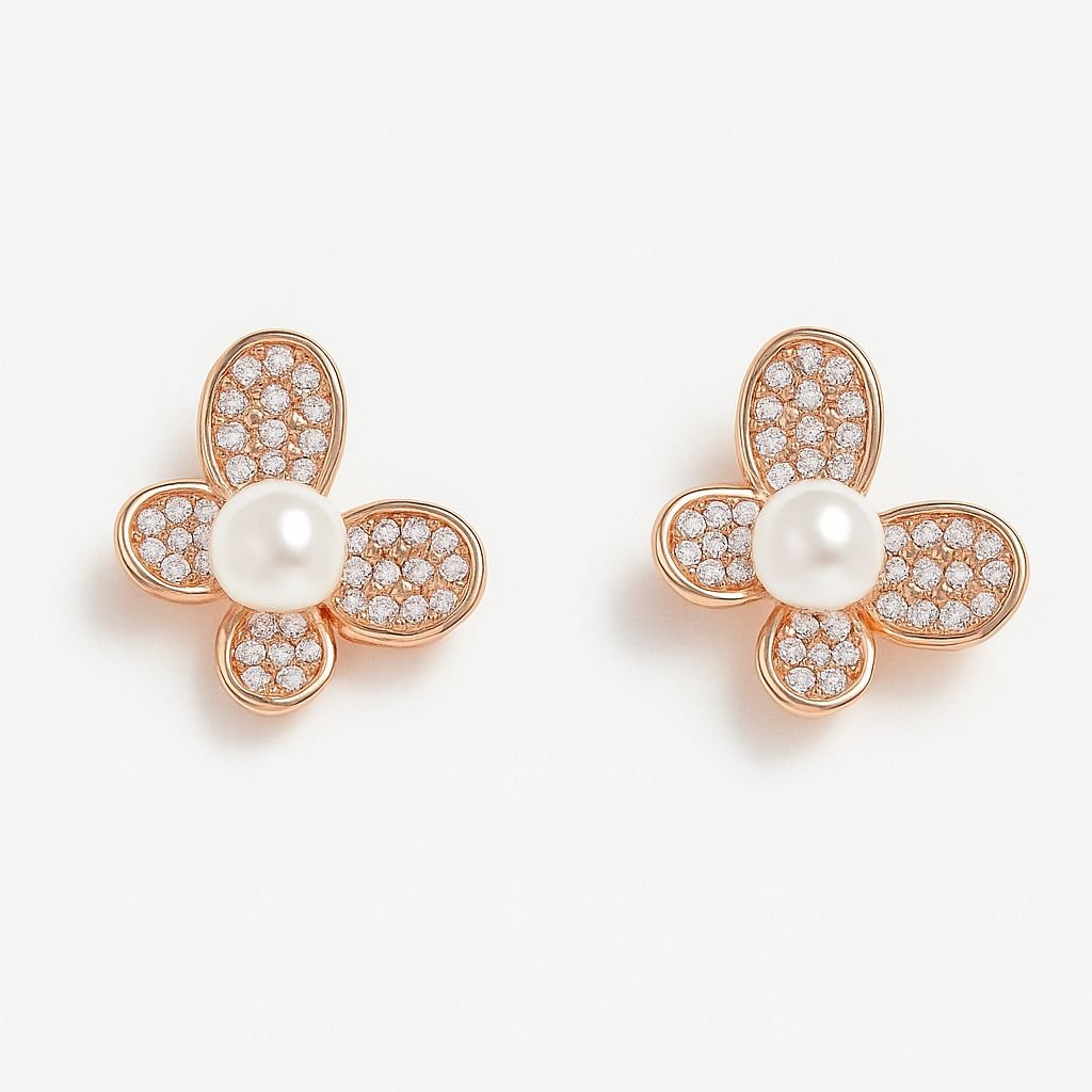 Rose Gold Flower Stud Earrings with four pave CZ petals surrounding a central white imitation pearl. Rose Gold Flower Stud Earrings with four pave CZ petals surrounding a central white imitation pearl.