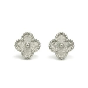 Silver Toned Clover Stud Earrings with a beaded edge and a sunburst or ray pattern radiating from the center.
