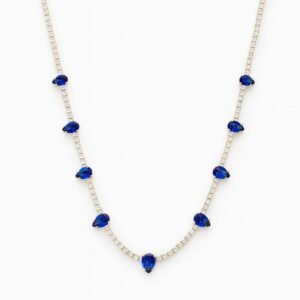 Rose Gold Plated Fine Chain Necklace with a small, curved pendant shaped like the head and shaft of a nail.