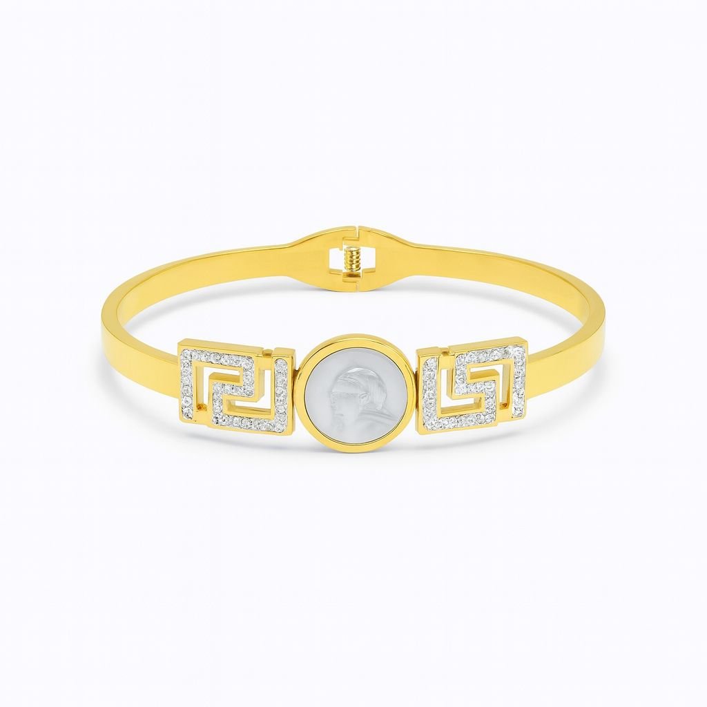 Women's Gold Plated Bangle with a central cameo and two CZ pave Greek Key motifs.