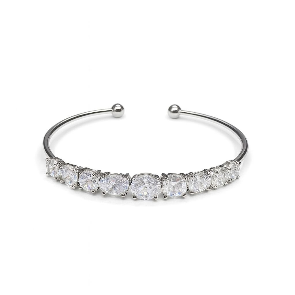 Women's Silver Bangle Bracelet with a center round CZ stone surrounded by mixed round and square cut stones.